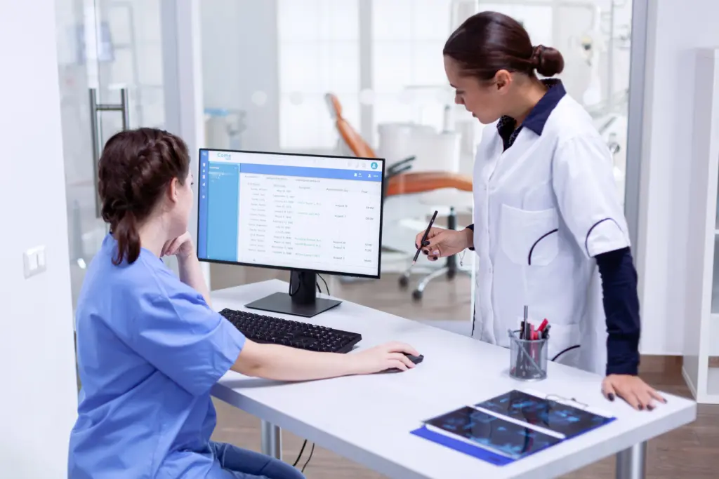 doctors examining ehr software