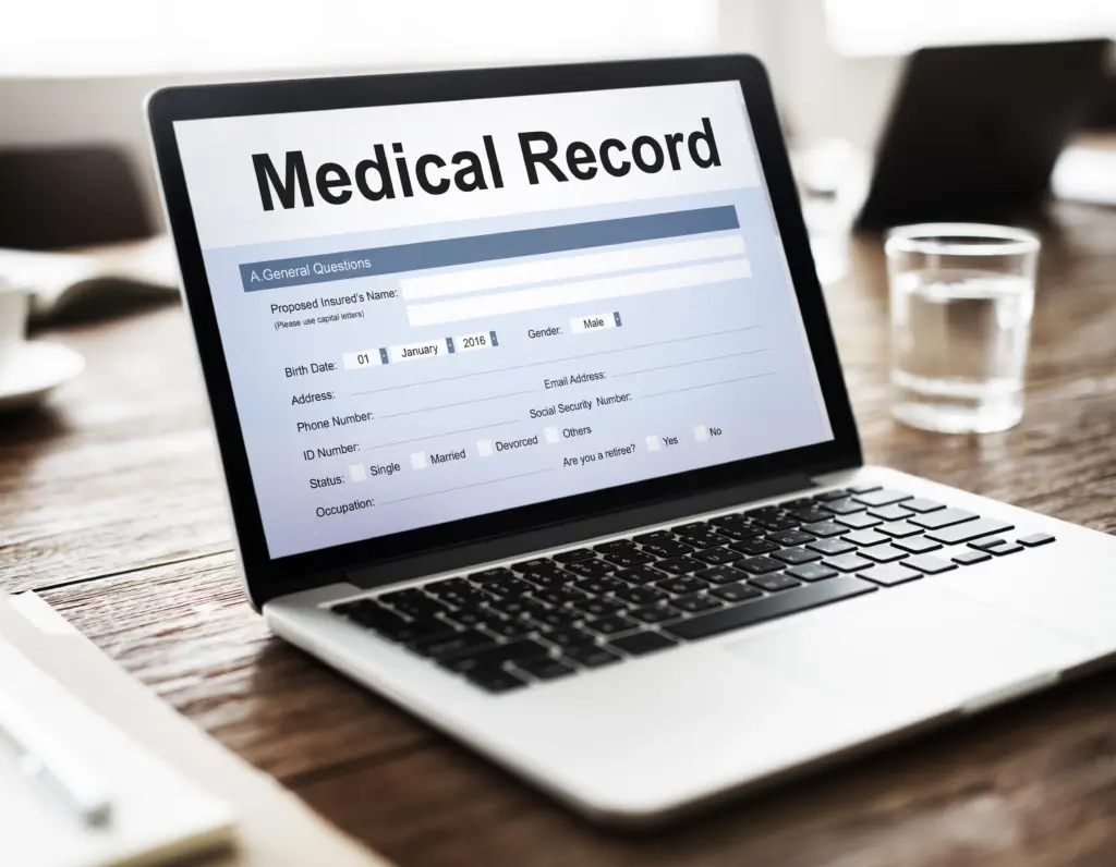 medical records on laptop